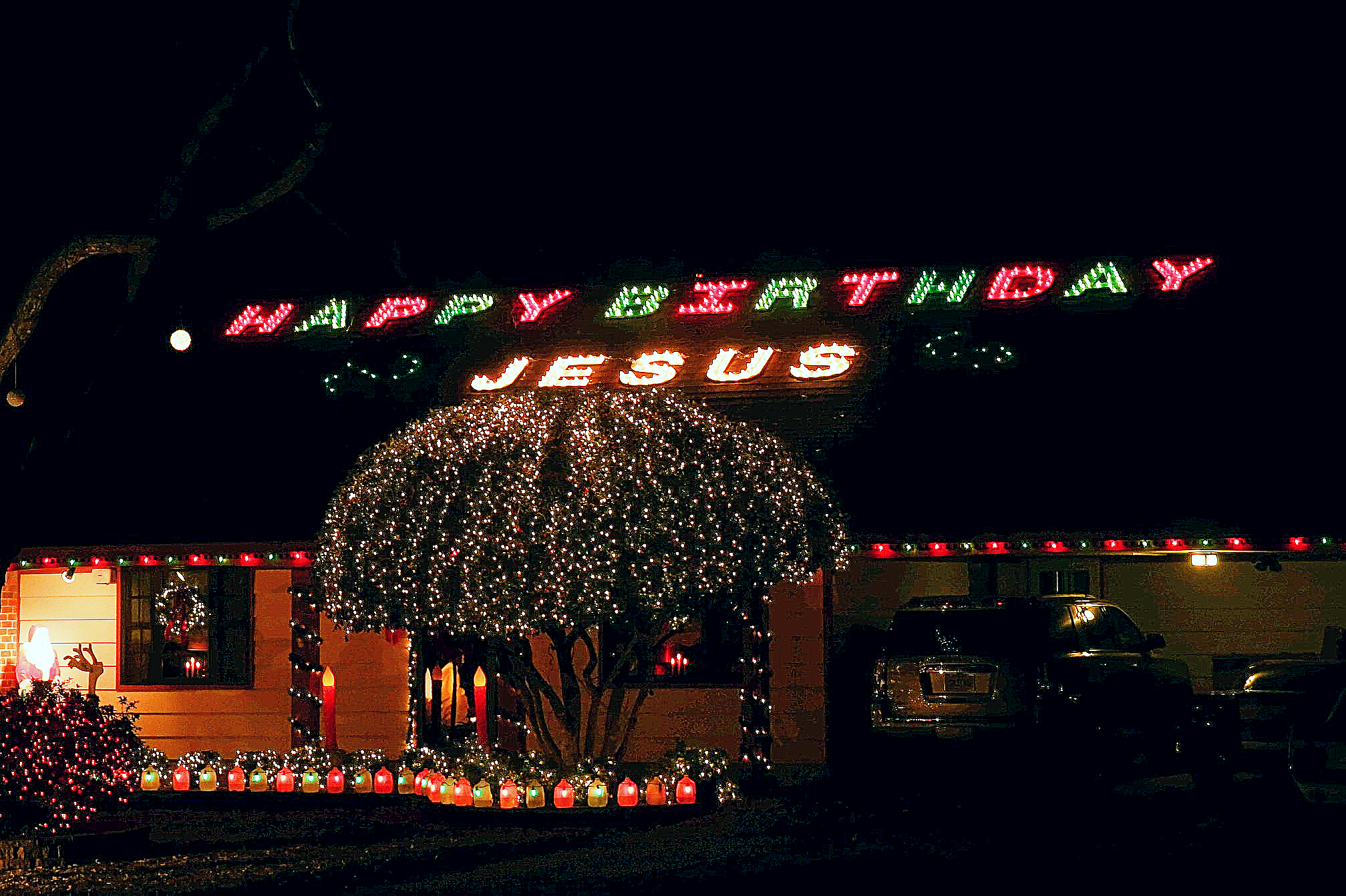 Christmas lights spell out Happy Birthday Jesus